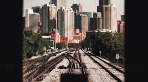 Preview wallpaper rails, railway, city, buildings, architecture