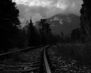 Preview wallpaper rails, turn, trees, mountains, landscape, black and white