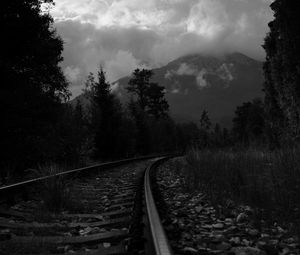 Preview wallpaper rails, turn, trees, mountains, landscape, black and white