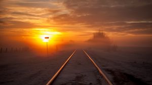 Preview wallpaper railway, fog, snow, sunset, horizon