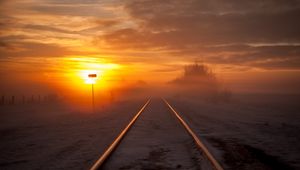 Preview wallpaper railway, fog, snow, sunset, horizon