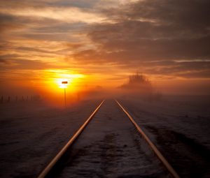 Preview wallpaper railway, fog, snow, sunset, horizon
