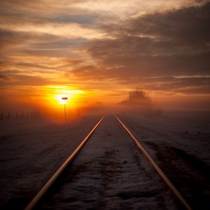 Preview wallpaper railway, fog, snow, sunset, horizon