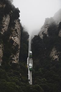 Preview wallpaper railway, fog, train, mountains, aerial view