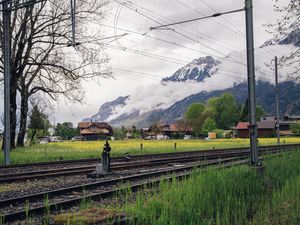 Preview wallpaper railway, mountains, grass