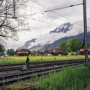 Preview wallpaper railway, mountains, grass