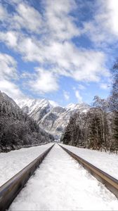 Preview wallpaper railway, mountains, snowy, distance