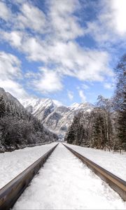 Preview wallpaper railway, mountains, snowy, distance