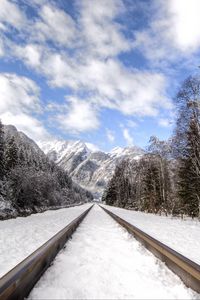 Preview wallpaper railway, mountains, snowy, distance