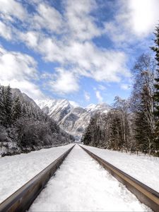 Preview wallpaper railway, mountains, snowy, distance