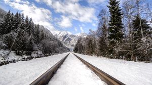 Preview wallpaper railway, mountains, snowy, distance