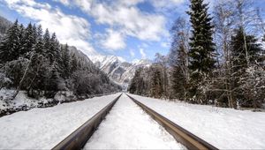 Preview wallpaper railway, mountains, snowy, distance