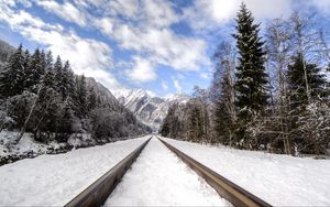 Preview wallpaper railway, mountains, snowy, distance