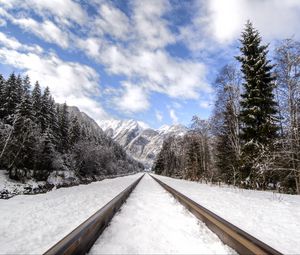 Preview wallpaper railway, mountains, snowy, distance