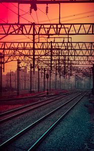 Preview wallpaper railway, rails, construction, traffic light, sunset