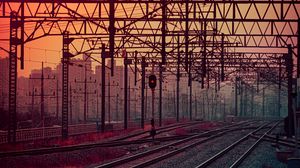 Preview wallpaper railway, rails, construction, traffic light, sunset