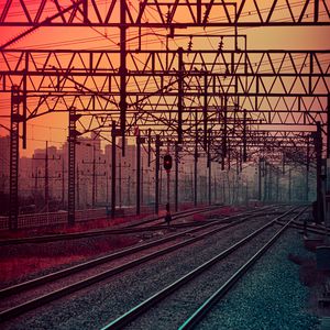 Preview wallpaper railway, rails, construction, traffic light, sunset