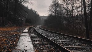 Preview wallpaper railway, rails, forest, cloudy