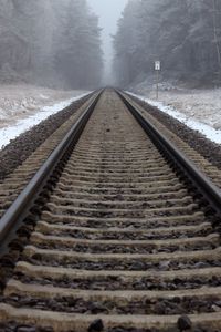 Preview wallpaper railway, rails, forest, snow, fog