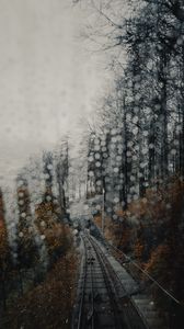 Preview wallpaper railway, rails, glare, fog, forest