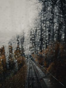 Preview wallpaper railway, rails, glare, fog, forest