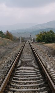 Preview wallpaper railway, rails, hills, fog