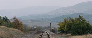 Preview wallpaper railway, rails, hills, fog