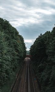 Preview wallpaper railway, rails, trees, tunnel, corridor