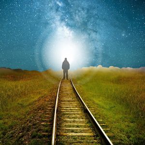 Preview wallpaper railway, silhouette, road, light, starry sky