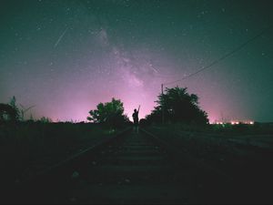 Preview wallpaper railway, starry sky, man, night