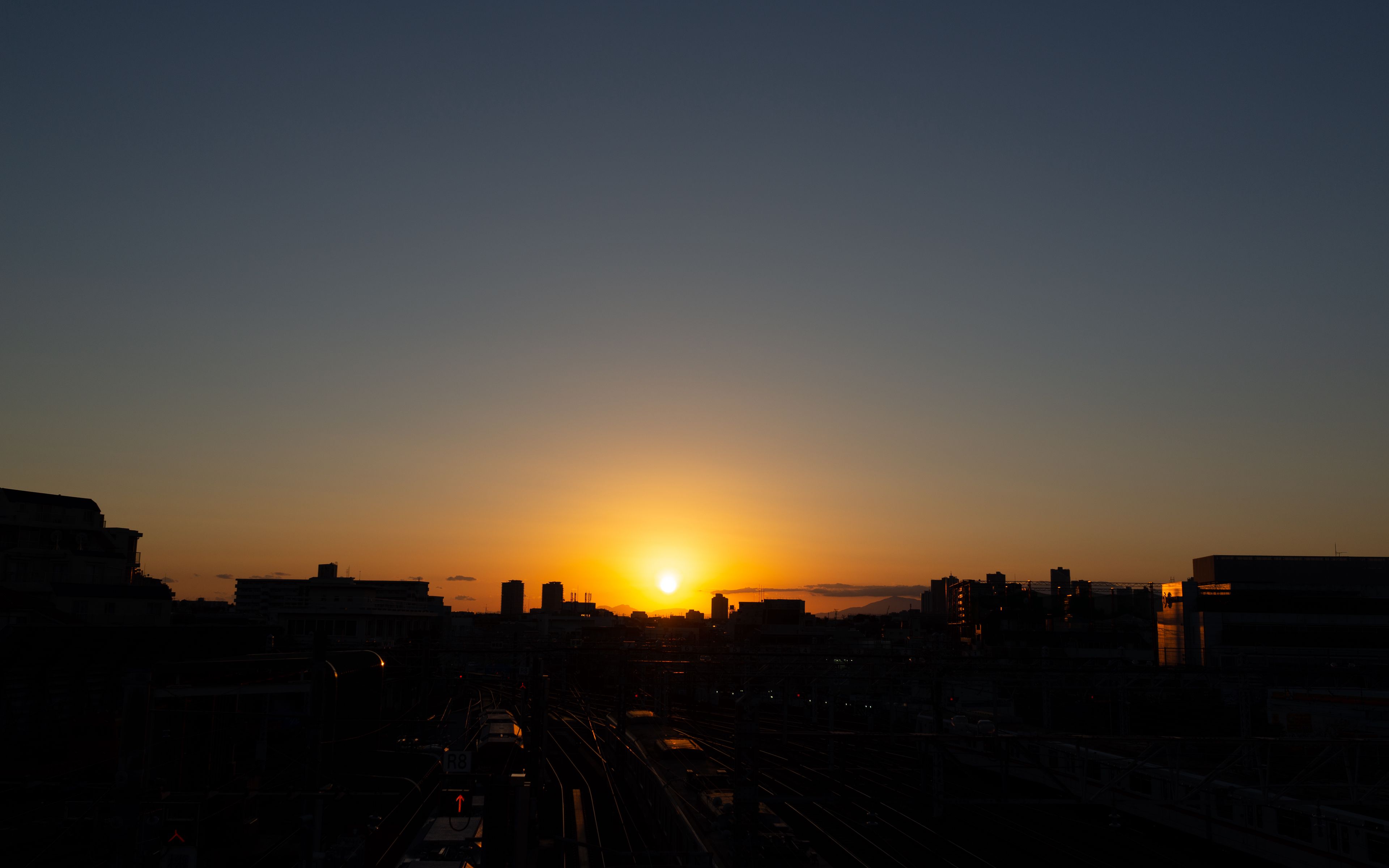 Download wallpaper 3840x2400 railway, station, sunset, horizon, night