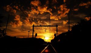 Preview wallpaper railway, sunset, clouds, station, wires, traffic lights