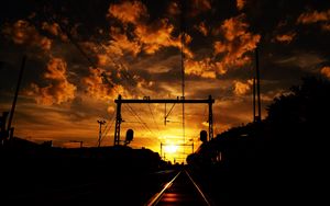 Preview wallpaper railway, sunset, clouds, station, wires, traffic lights