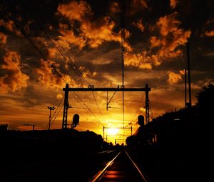 Preview wallpaper railway, sunset, clouds, station, wires, traffic lights