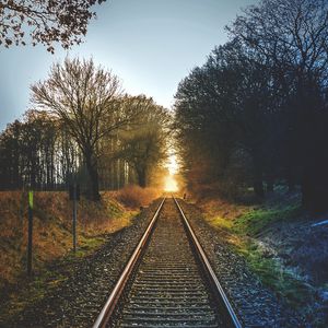 Preview wallpaper railway, trees, sunset