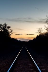 Preview wallpaper railway, trees, twilight, dark