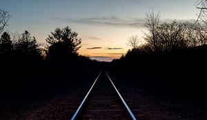 Preview wallpaper railway, trees, twilight, dark