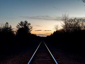 Preview wallpaper railway, trees, twilight, dark