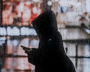 Preview wallpaper rain, silhouette, hood, drops