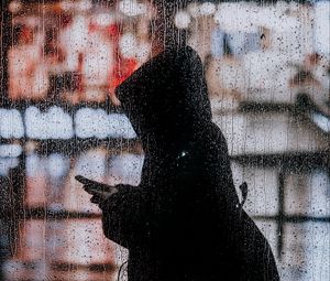 Preview wallpaper rain, silhouette, hood, drops