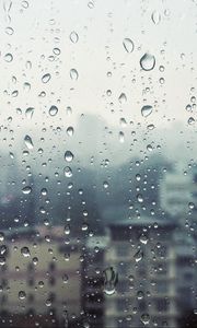 Preview wallpaper rain, window, glass, buildings, drops