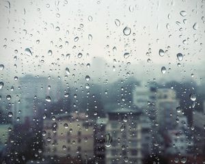 Preview wallpaper rain, window, glass, buildings, drops