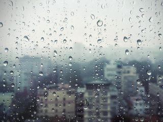 Download wallpaper 320x240 rain, window, glass, buildings, drops nokia e72,  e71, asha, alcatel onetouch hd background