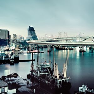 Preview wallpaper rainbow bridge, tokyo, city, river, skyscraper