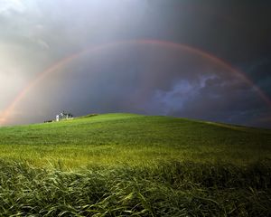 Preview wallpaper rainbow, field, meadow, hill, construction, cloudy