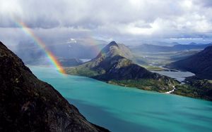 Preview wallpaper rainbow, ocean, mountains, land, relief, landscape, sky, clouds, river, coast
