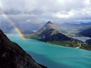 Preview wallpaper rainbow, ocean, mountains, land, relief, landscape, sky, clouds, river, coast