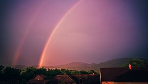 Preview wallpaper rainbow, sky, buildings, dusk