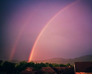 Preview wallpaper rainbow, sky, buildings, dusk