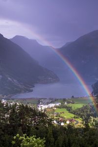 Preview wallpaper rainbow, valley, trees, mountains, houses, lake